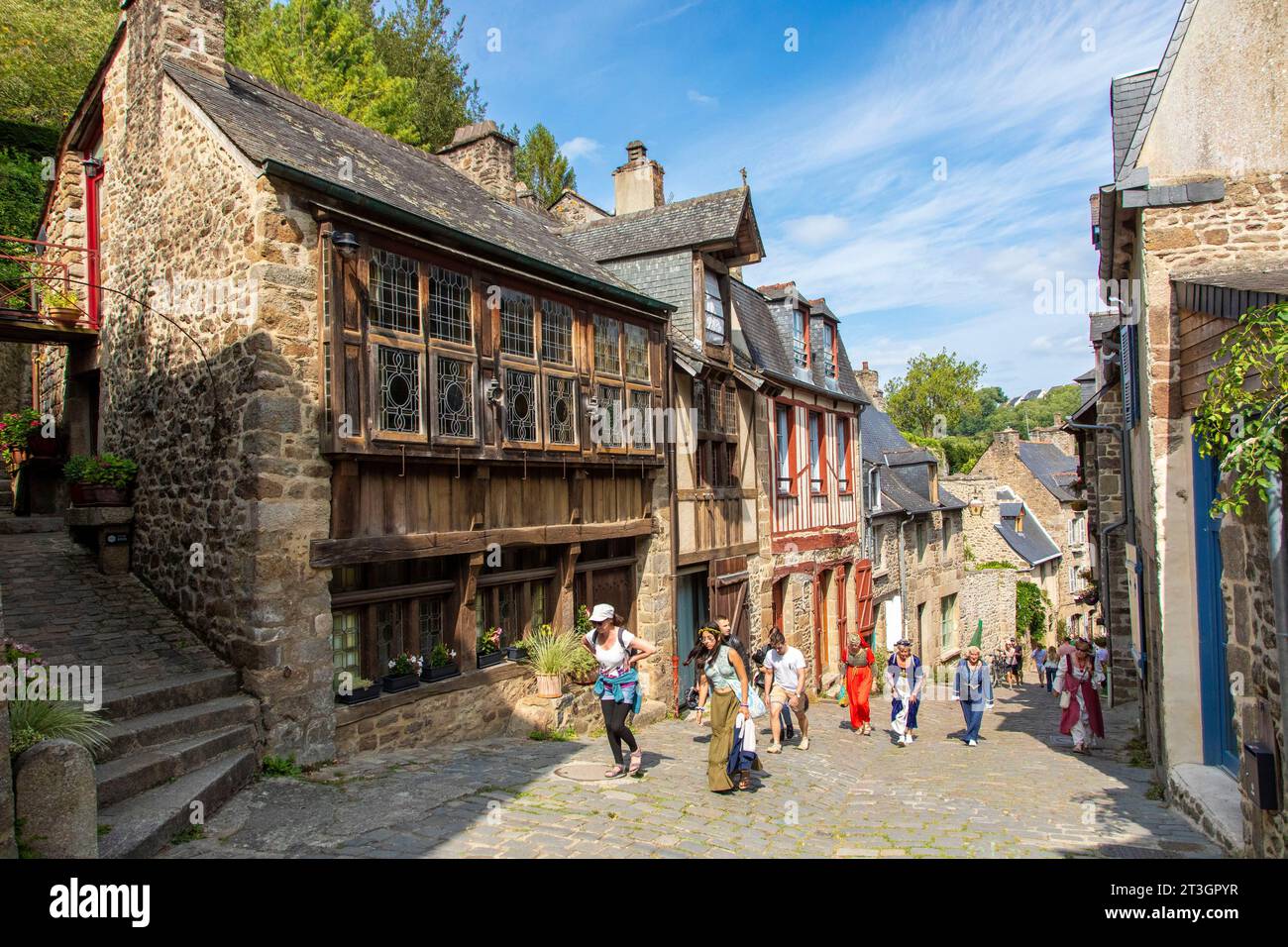 France, Cotes-d'Armor, Dinan, the old town, medieval houses of Petit Fort street during the rampart festival Stock Photo