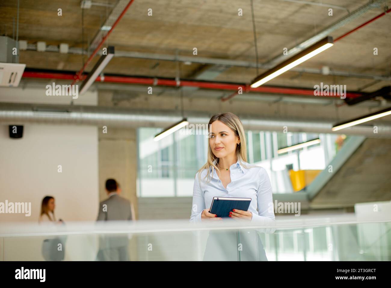 Man woman in office hallway hi-res stock photography and images - Alamy