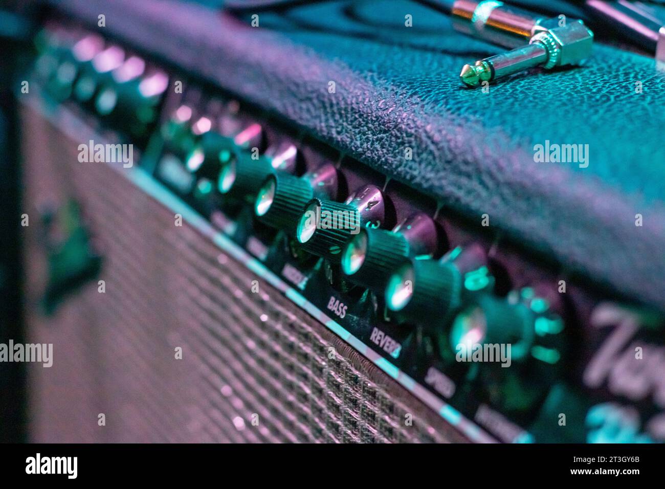 Knobs on Guitar Amplifier close up, macro photo Stock Photo