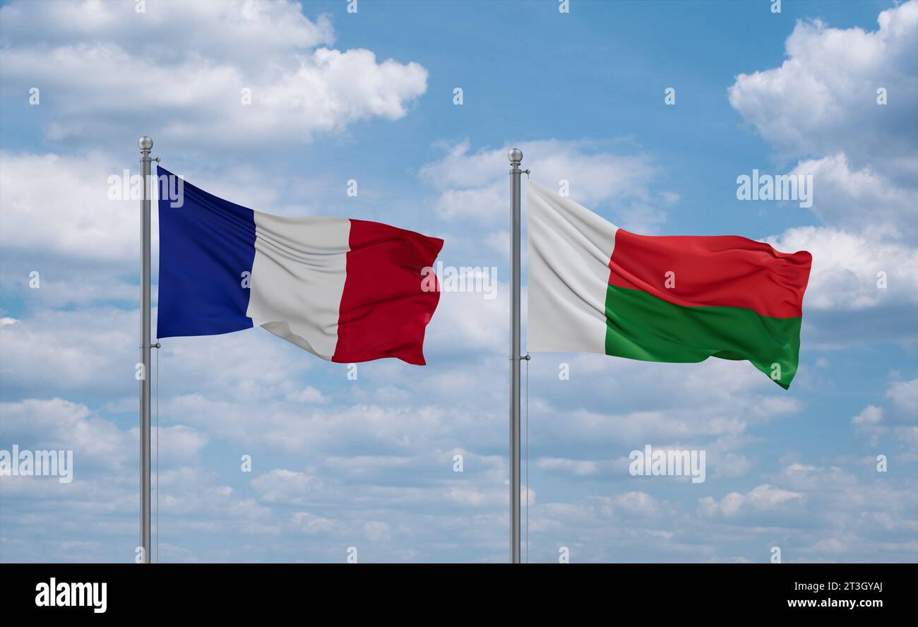 Madagascar and France flags waving together on blue cloudy sky, two country relationship concept