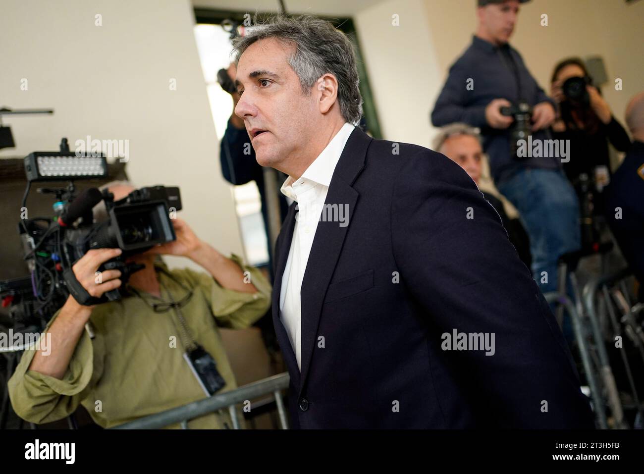 Michael Cohen returns to the courtroom after a break in proceedings at ...