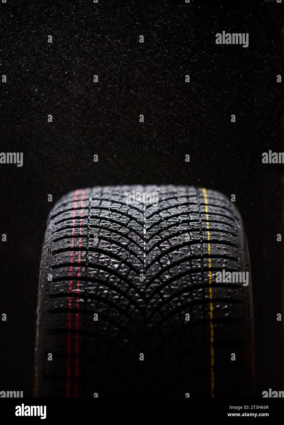 Close up of wet winter tyres Stock Photo