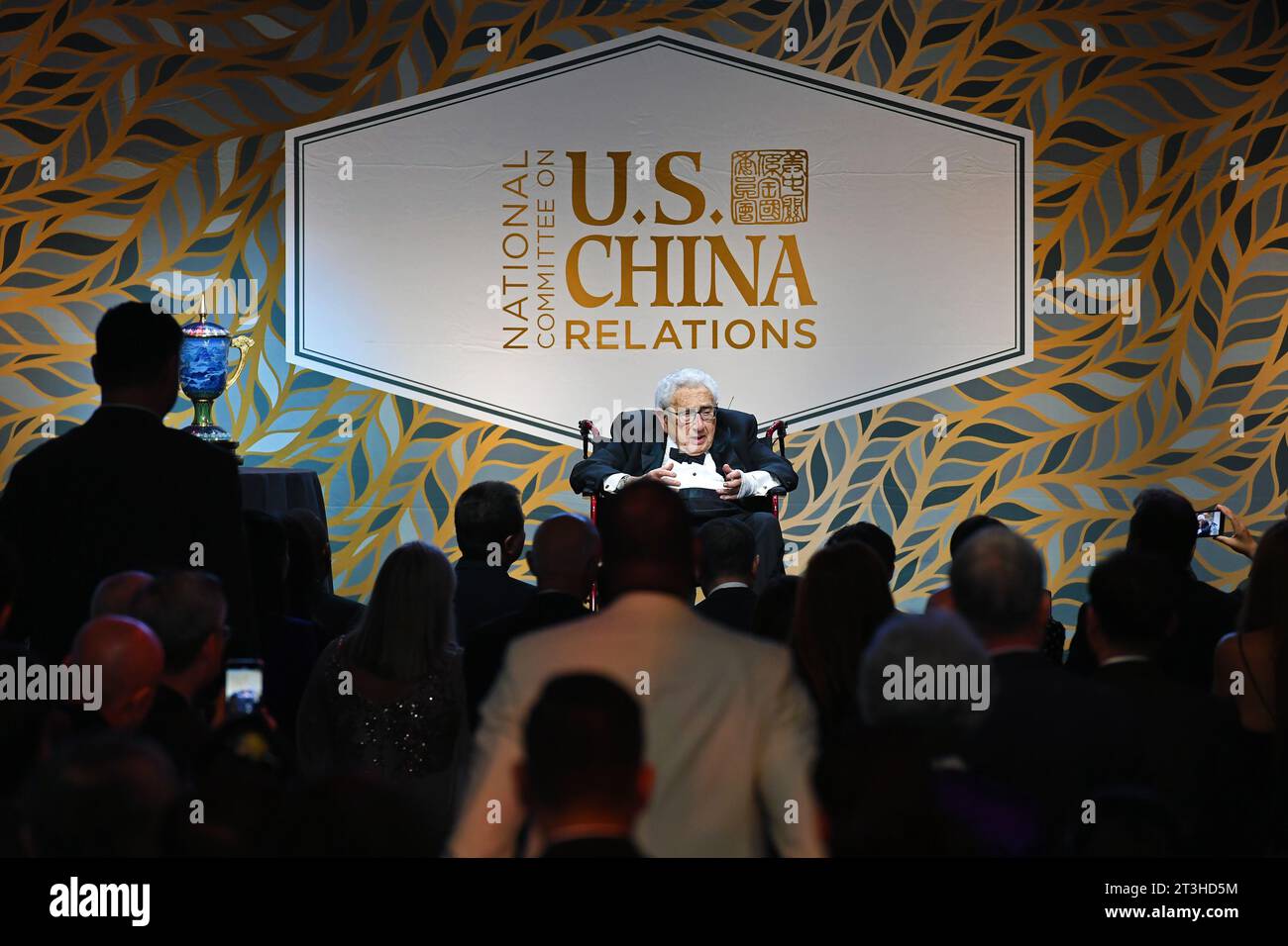 New York, USA. 24th Oct, 2023. Former U.S. Secretary of State Dr. Henry A. Kissinger (C) speaks at the annual Gala Dinner of the National Committee on U.S.-China Relations (NCUSCR) in New York, the United States, on Oct. 24, 2023. 'A peaceful relationship, a cooperative relationship between the U.S. and China is essential for peace and progress of the world,' said Kissinger on Tuesday. Credit: Li Rui/Xinhua/Alamy Live News Stock Photo