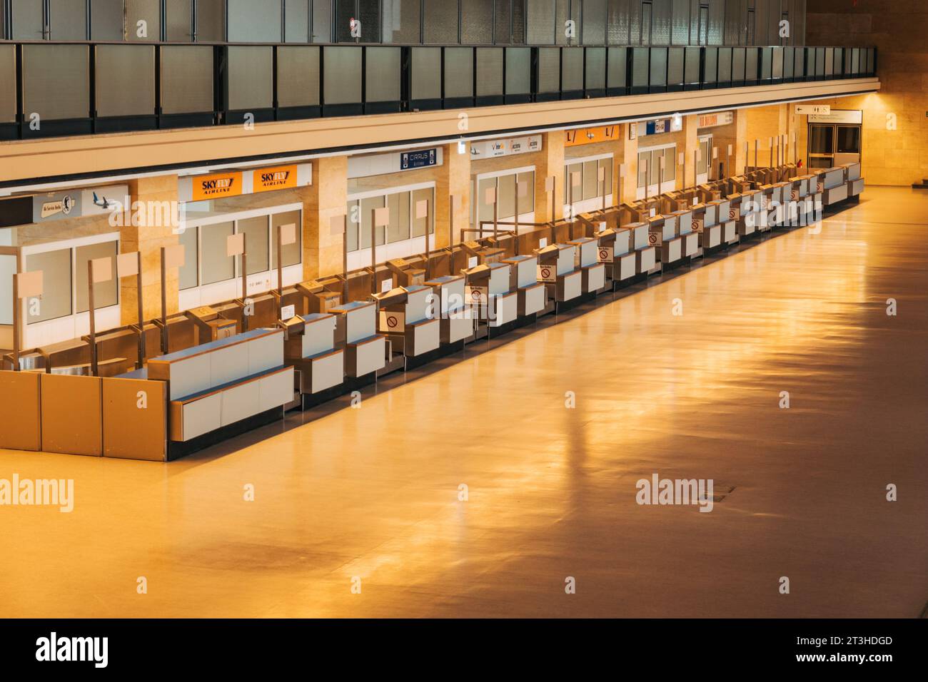 a row of check-in counters at Tempelhof Airport, Berlin, Germany. In operation from 1962 to 2008. Stock Photo