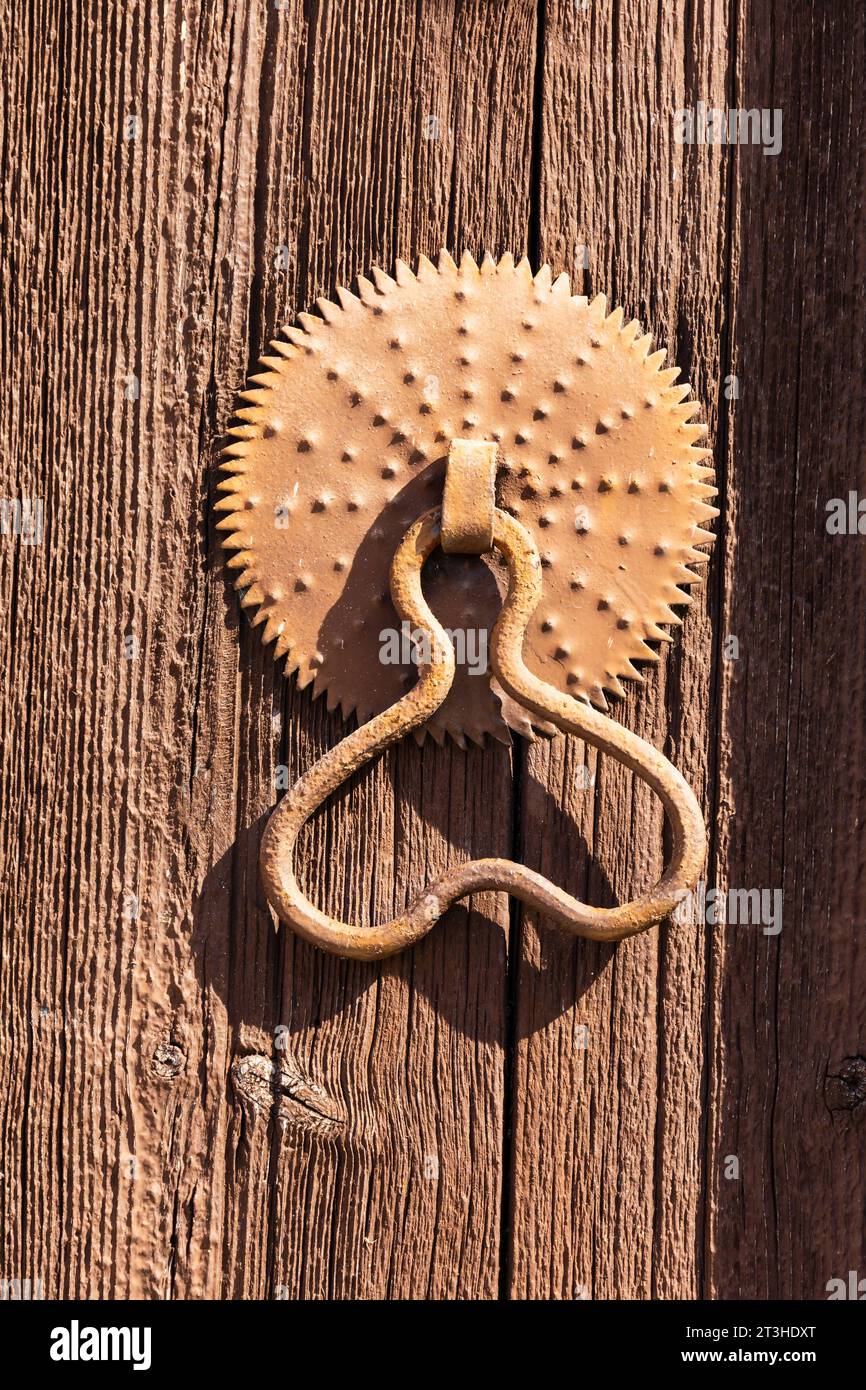 Traditional Cypriot door handle lock on woodendoor. Soloi, Morfou, Turkish Republic of northern Cyprus. North Cyprus Stock Photo