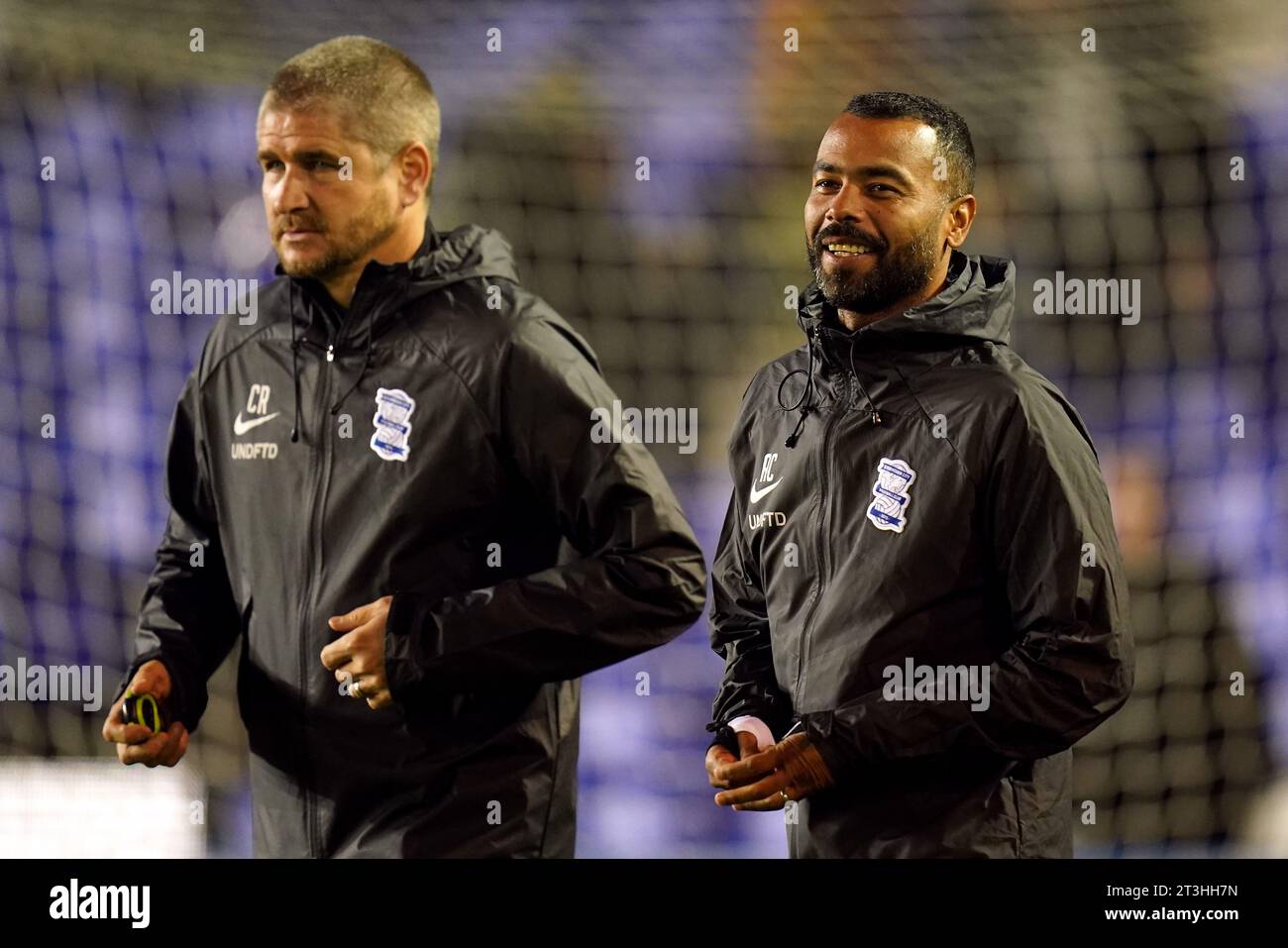 Birmingham City assistant manager Ashley Cole and Carl Robinson during