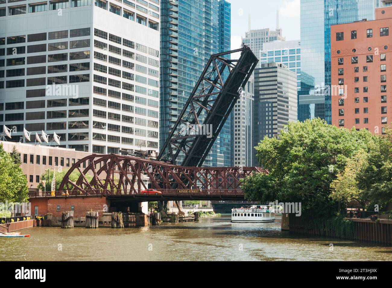 the old Chicago & Northwestern Railway Bridge, left in raised position, alongside the Kinzie Street bridge, Chicago Stock Photo