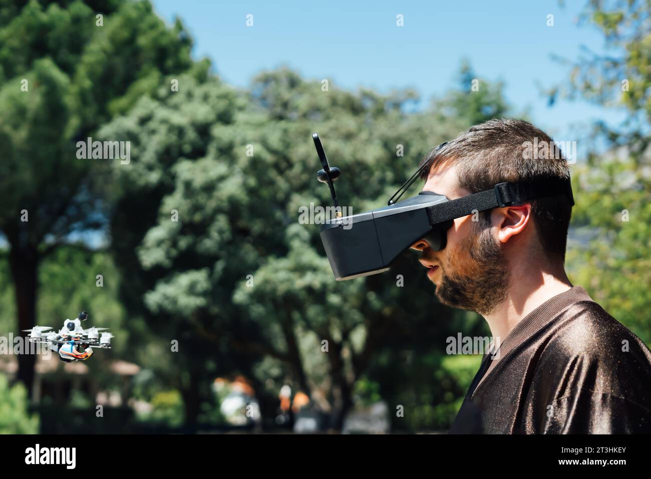 boy driving a drone with glasses Stock Photo
