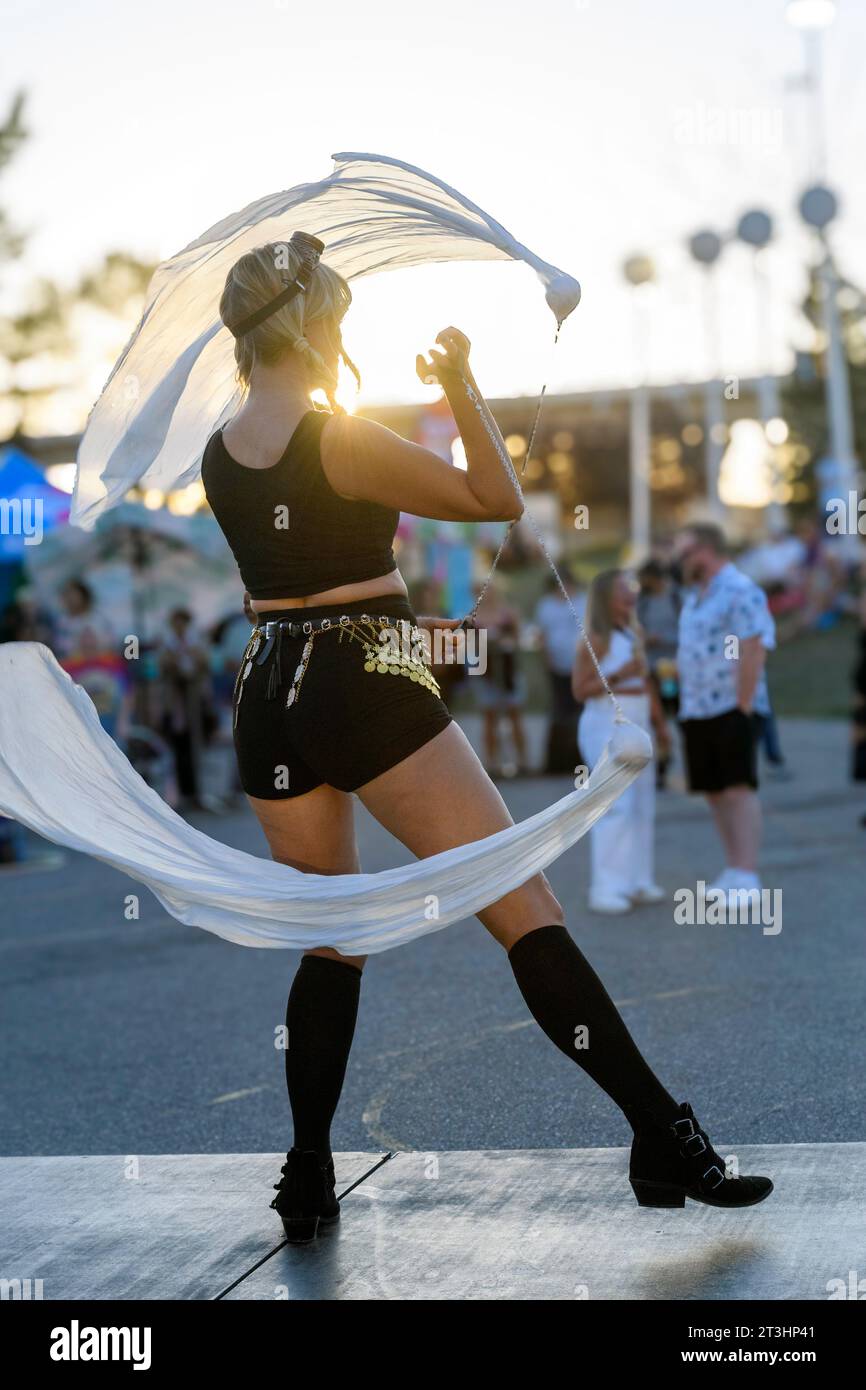 Scarf dancer entertaining the crowd at the Beakerhead Festival, Calgary Alberta Canada Stock Photo