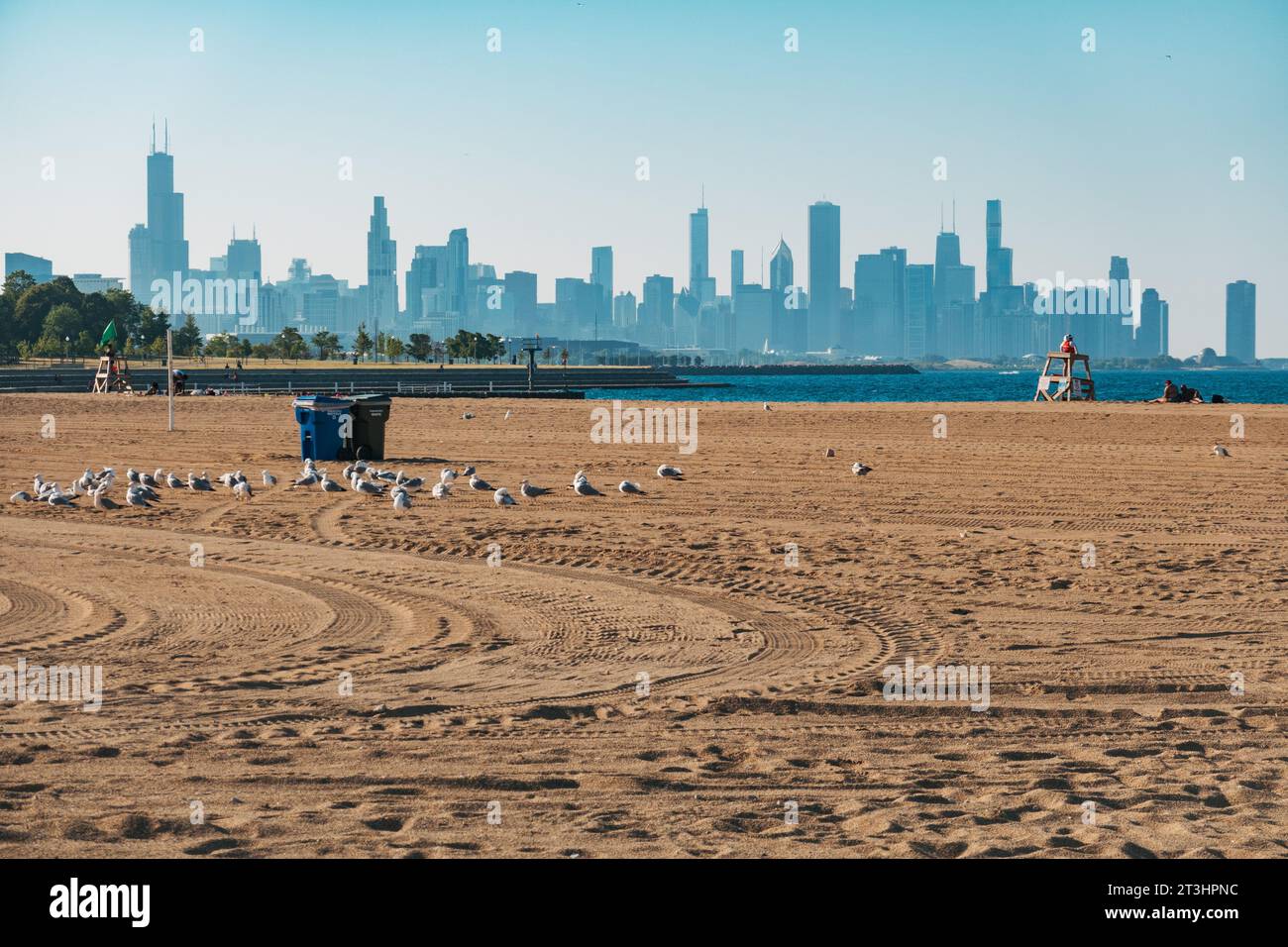 the Chicago skyline forms a backdrop for Oakwood Beach, on Lake Michigan, Chicago, United States Stock Photo