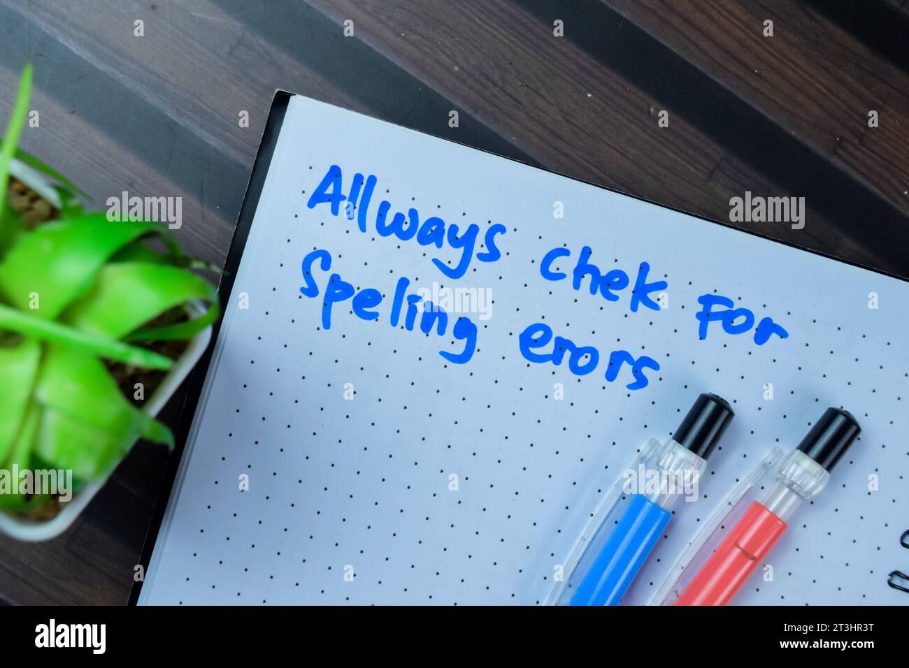 Concept of Always Check For Spelling Errors write on book isolated on Wooden Table. Stock Photo
