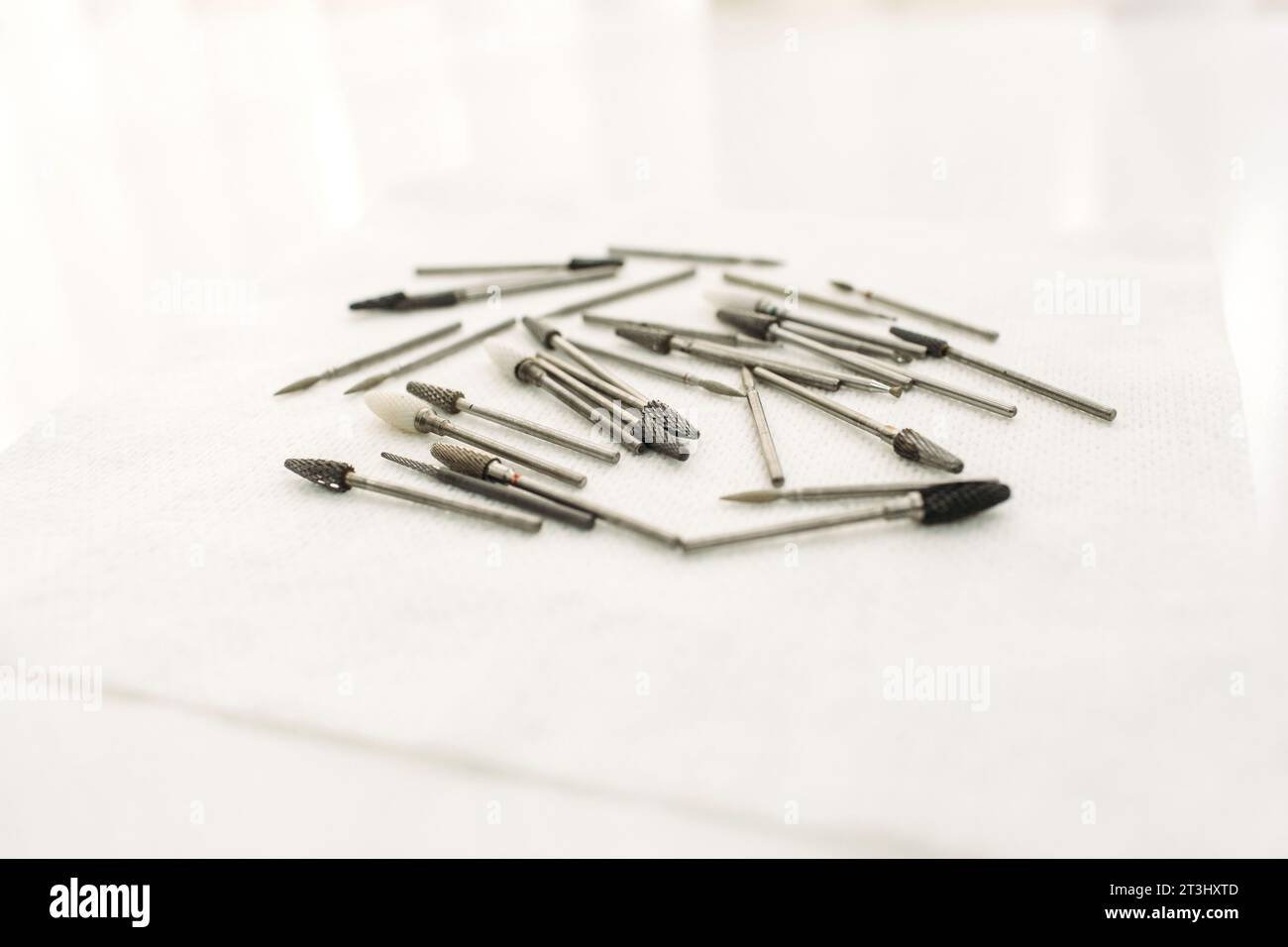 Podologist's medical instruments. Mill for processing the nail plate. Stock Photo