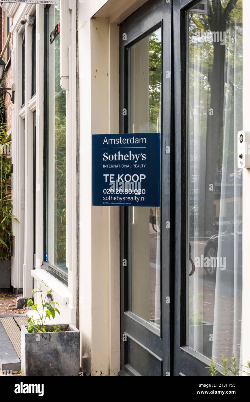 For Sale sign, Te Koop in Dutch, from Sotheby's International Realty on a property in Prinsengracht, Amsterdam. Stock Photo