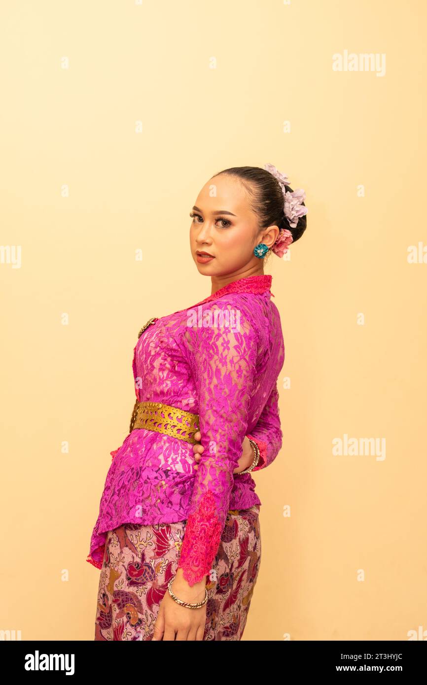 Beautiful bride from Balinese woman with pink dresses and make up on ...