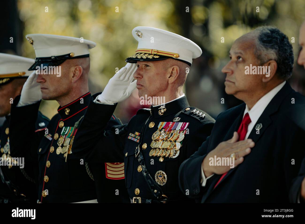 Jacksonville, United States. 23rd Oct, 2023. U.S. Marine Corps Commandant Gen. Eric Smith, center, and Secretary of the Navy Carlos Del Toro, right, salute during the 40th Beirut Memorial Observance Ceremony at Lejeune Memorial Gardens October 23, 2023 in Jacksonville, North Carolina. The memorial observance is in remembrance of the lives lost in the terrorist attacks at U.S. Marine Barracks in Beirut. Credit: LCpl. Zachary Zephir/U.S. Marines/Alamy Live News Stock Photo
