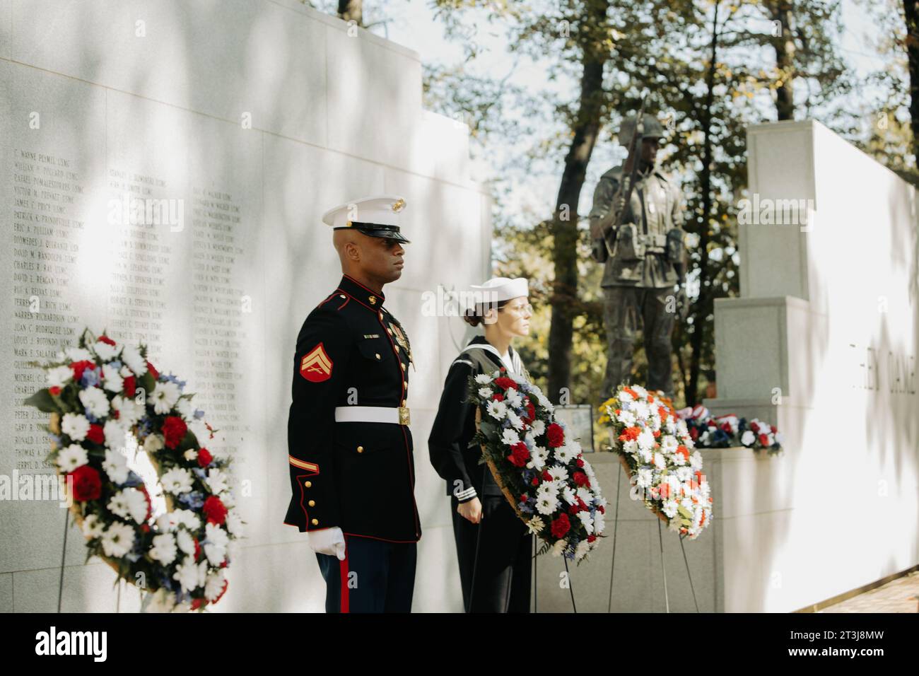 Jacksonville, United States. 23rd Oct, 2023. A U.S Marine and Navy Sailor honor guard stand at the Beirut Memorial Wall during the 40th Beirut Memorial Observance Ceremony at Lejeune Memorial Gardens October 23, 2023 in Jacksonville, North Carolina. The memorial observance is in remembrance of the lives lost in the terrorist attacks at U.S. Marine Barracks in Beirut. Credit: LCpl. Zachary Zephir/U.S. Marines/Alamy Live News Stock Photo