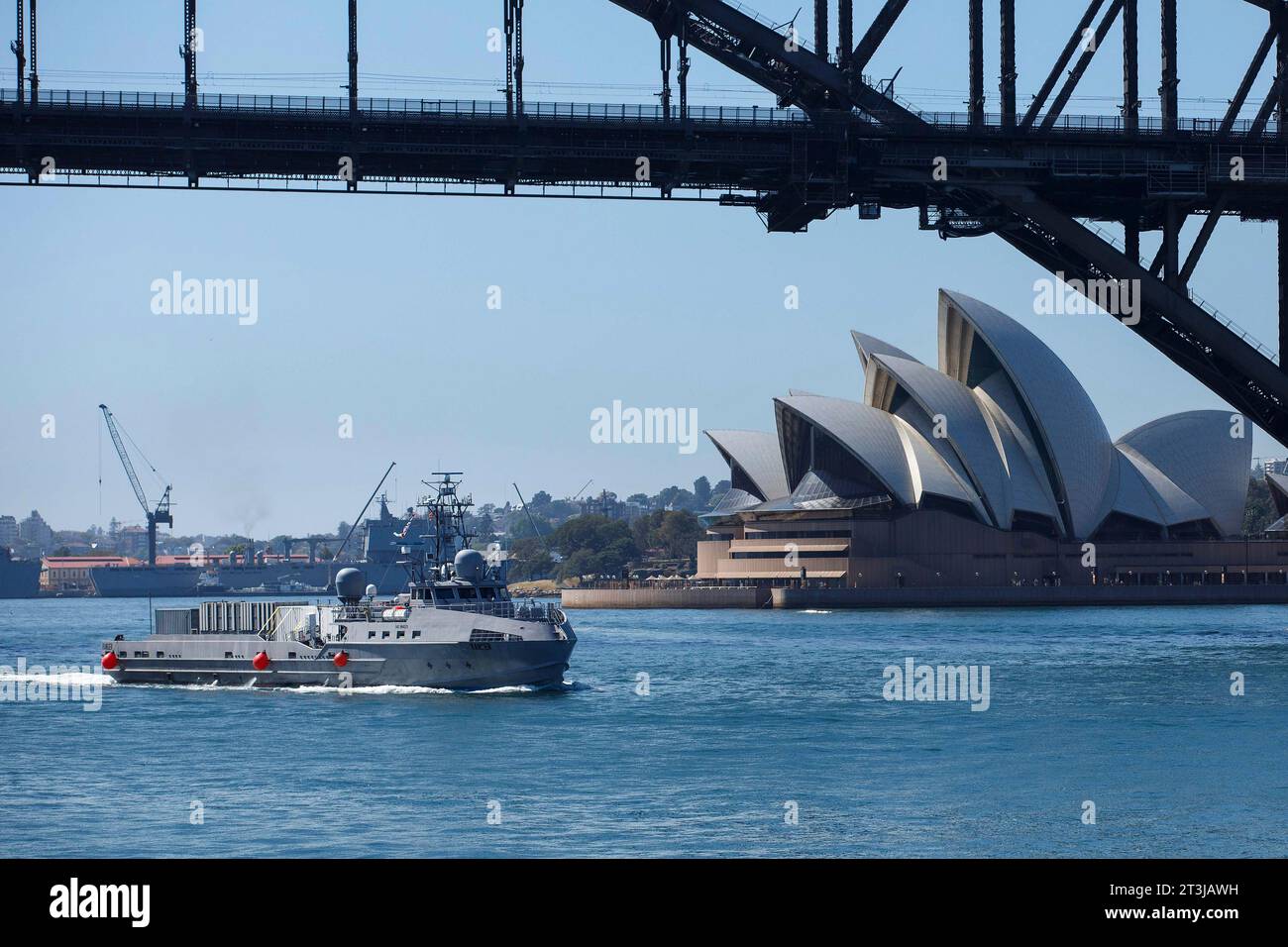 Sydney, Australia. 24th Oct, 2023. The U.S Navy unmanned surface vessel USV Ranger transits underneath the Sydney Harbor bridge as it passes the Sydney Opera House during a scheduled port visit, October 24, 2023 in Sydney, NSW, Australia. Credit: ESN Pierson Hawkins/US Army/Alamy Live News Stock Photo