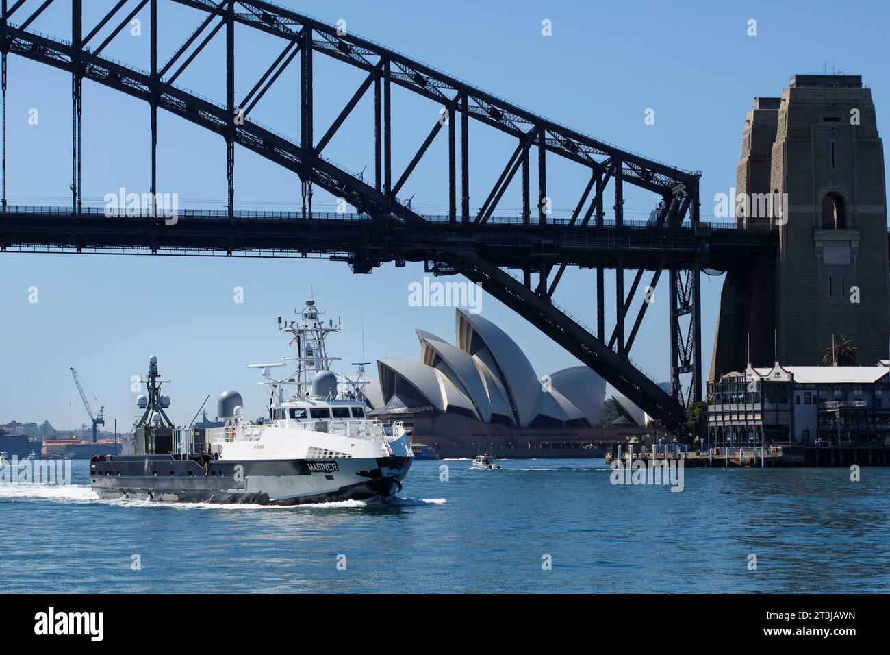 Sydney, Australia. 24th Oct, 2023. The U.S Navy unmanned surface vessel USV Mariner transits underneath the Sydney Harbor bridge as it passes the Sydney Opera House during a scheduled port visit, October 24, 2023 in Sydney, NSW, Australia. Credit: ESN Pierson Hawkins/US Army/Alamy Live News Stock Photo