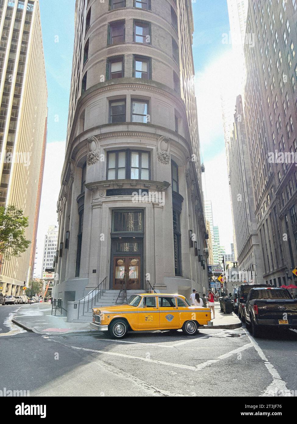 Vintage checker cab parked in front of Cocoa Exchange residential