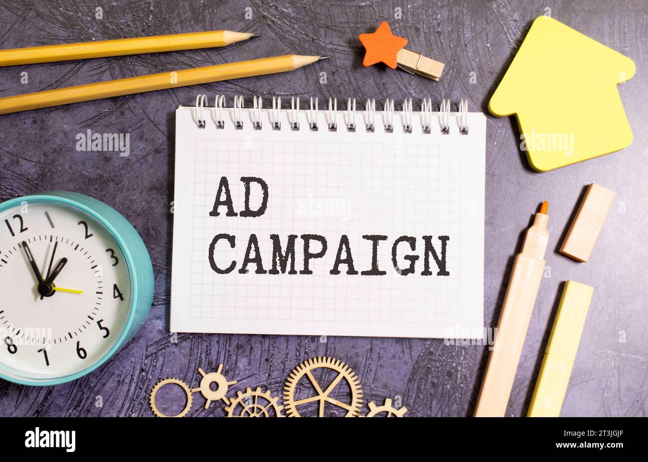 AD CAMPAIGN text on a paper with keyboard on grey background Stock ...