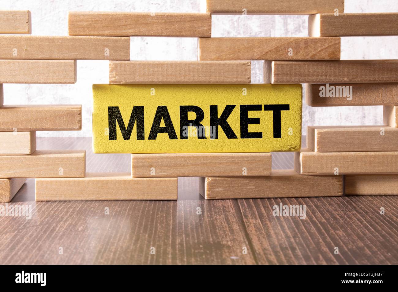 Business concept. Against the background of business graphics and pens, a sign with the inscription - MARKET Stock Photo
