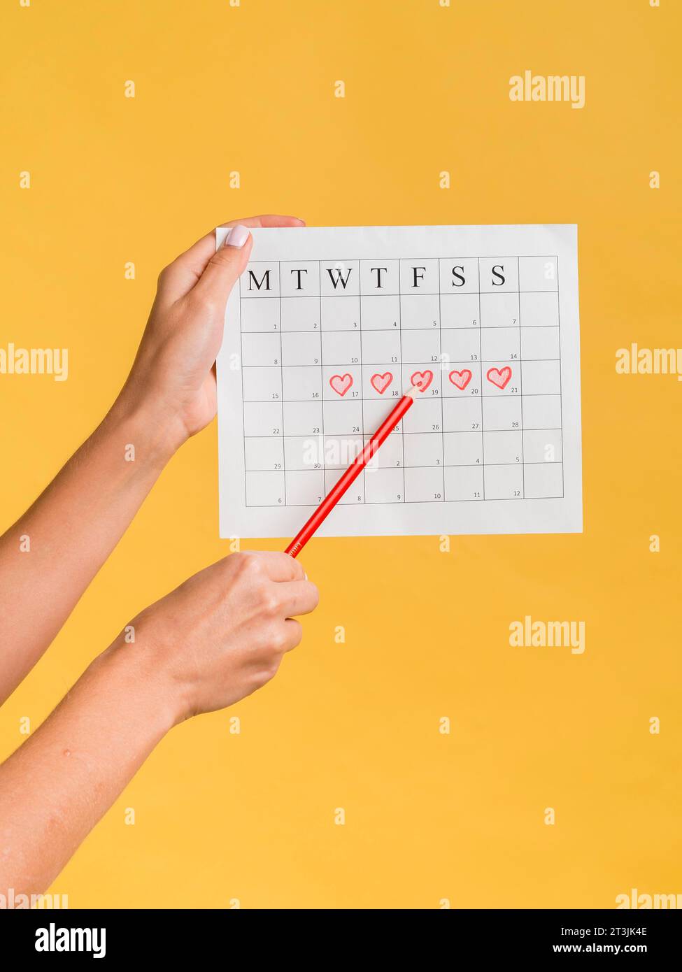 Front view menstruation calendar with hearts pencil Stock Photo