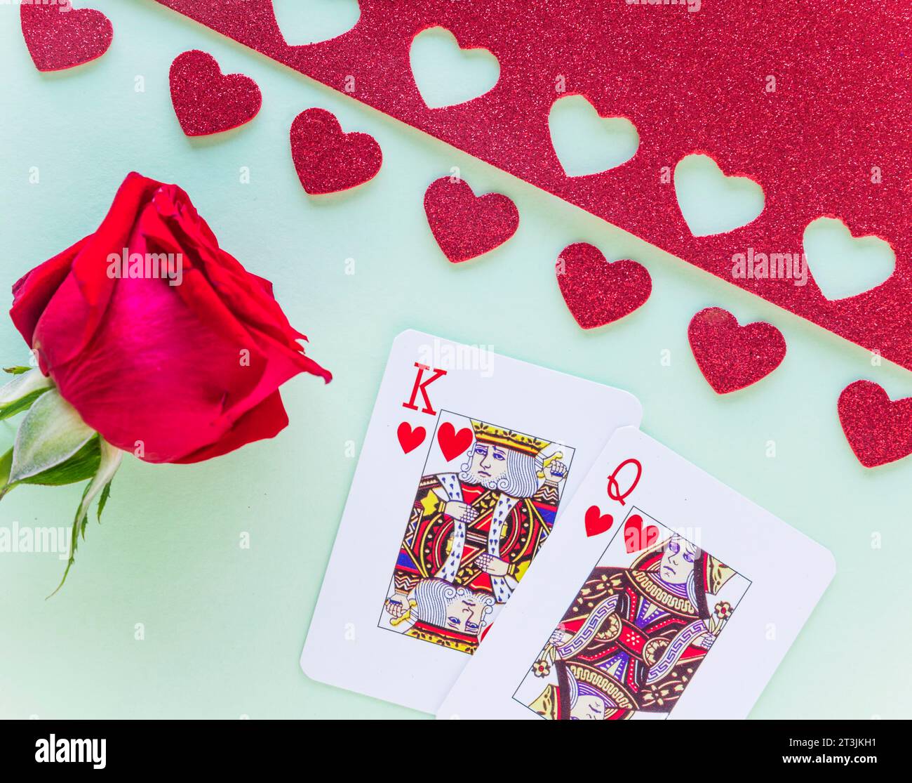 King queen hearts playing cards with rose Stock Photo