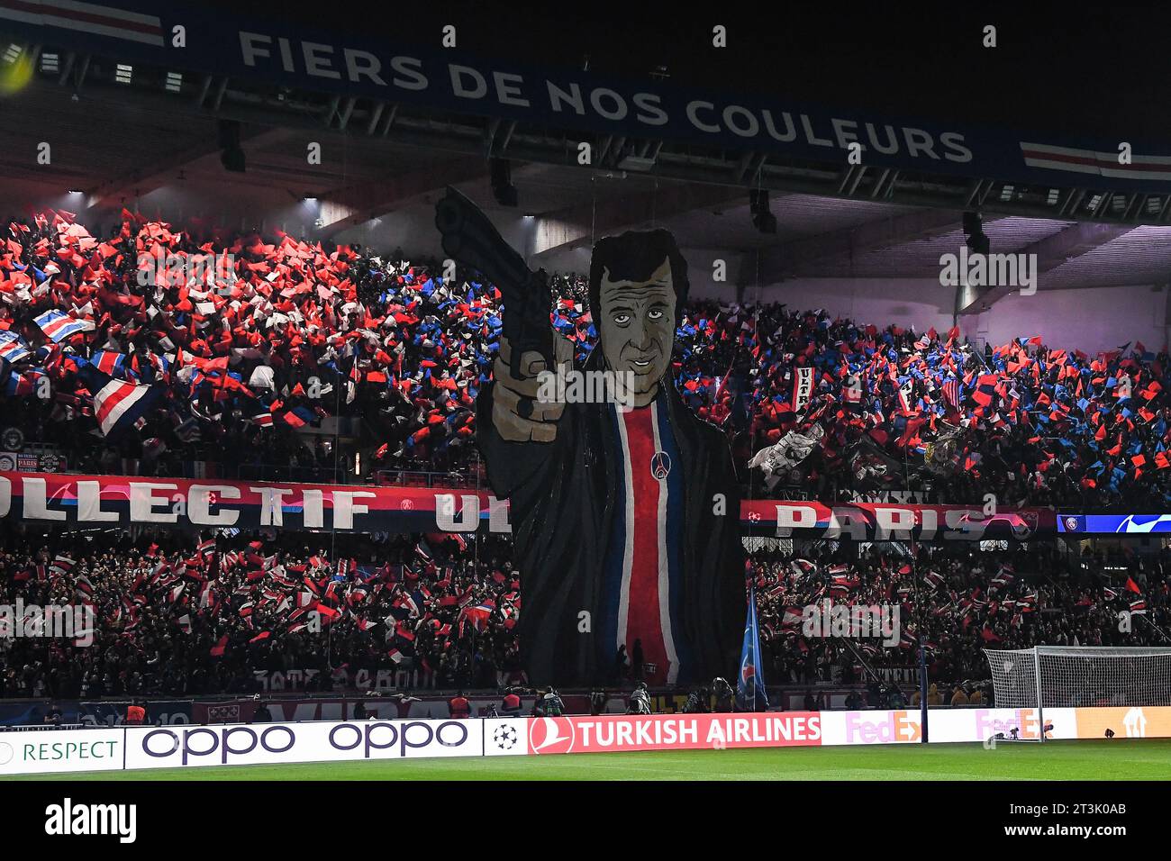 Paris, France, France. 25th Oct, 2023. PSG supporters deploy a giant tifo representing French actor Jean-Paul BELMONDO during the UEFA Champions League group F match between Paris Saint-Germain and AC Milan at Parc des Princes Stadium on October 25, 2023 in Paris, France. (Credit Image: © Matthieu Mirville/ZUMA Press Wire) EDITORIAL USAGE ONLY! Not for Commercial USAGE! Stock Photo