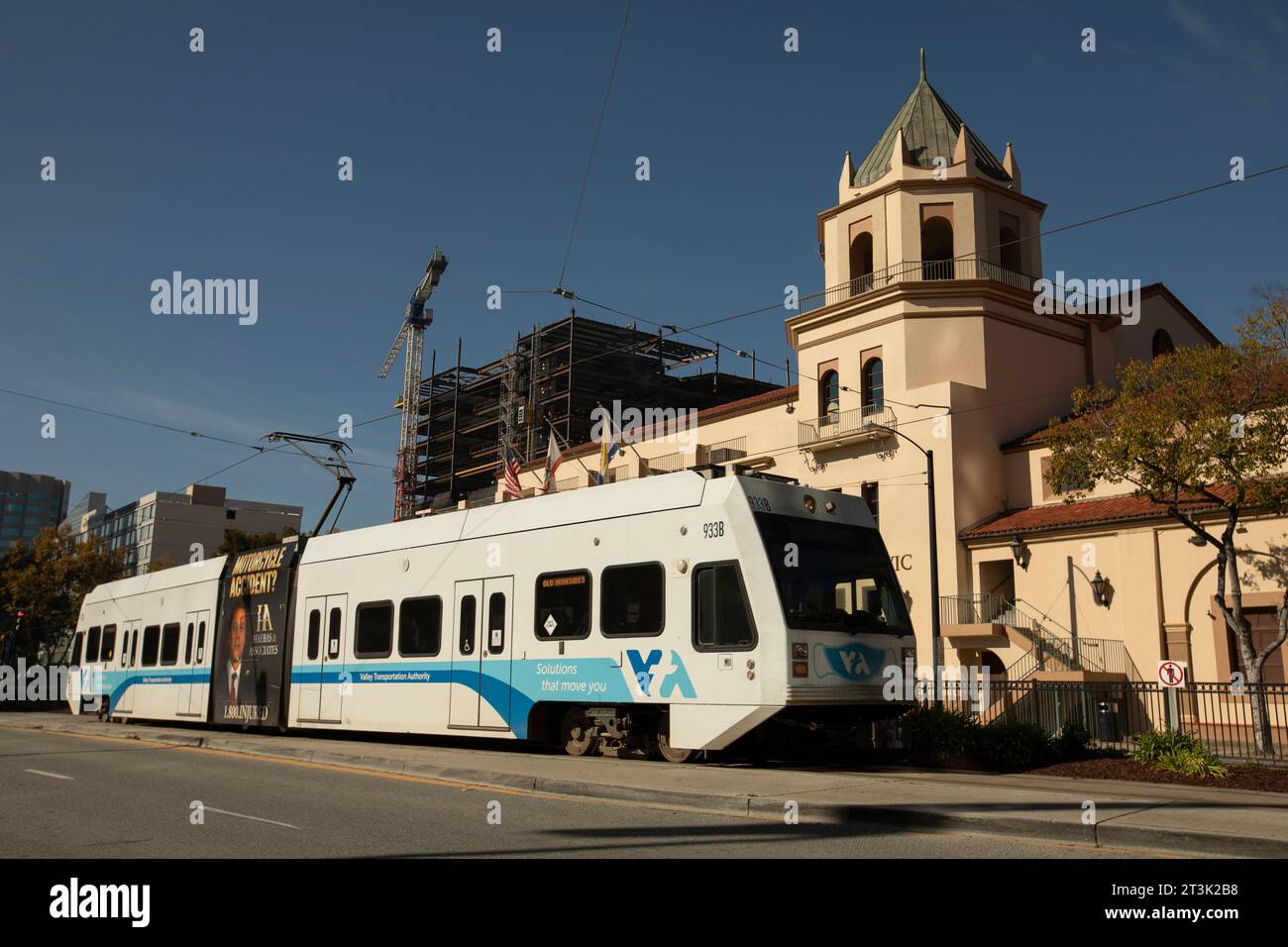 San Jose, California, USA - November 17, 2021: Afternoon sunlight shines on a VTA Valley Transportation Authority light rail train. Stock Photo