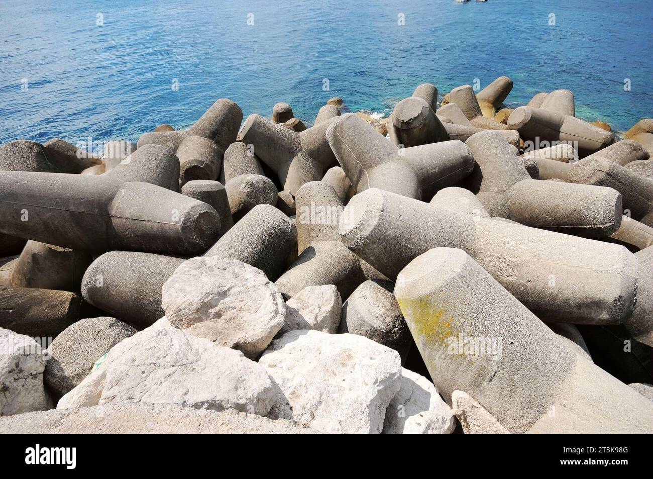 Photo of some breakwaters at Amafi beach in Naples, Italy Stock Photo ...