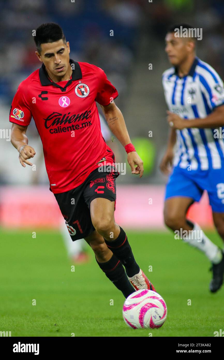 Monterrey, Mexico. 25th Oct, 2023. October 25th 2023, Estádio BBVA, Monterrey, Mexico: Liga BBVA MX postponed 4th round match between Monterrey Rayados and Club Tijuana Xolos. #7 Midfielder Club Tijuana, Alejandro Martinez running forward with the ball Mandatory Credit: Toby Tande/PXImages Credit: Px Images/Alamy Live News Stock Photo