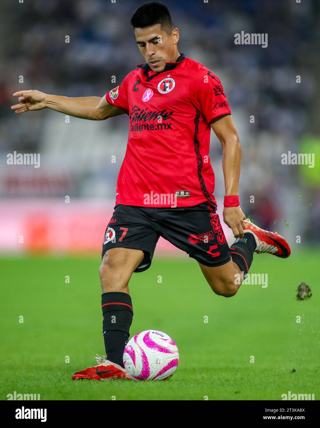 Monterrey, Mexico. 25th Oct, 2023. October 25th 2023, Estádio BBVA, Monterrey, Mexico: Liga BBVA MX postponed 4th round match between Monterrey Rayados and Club Tijuana Xolos. #7 Midfielder Club Tijuana, Alejandro Martinez running forward with the ball Mandatory Credit: Toby Tande/PXImages Credit: Px Images/Alamy Live News Stock Photo