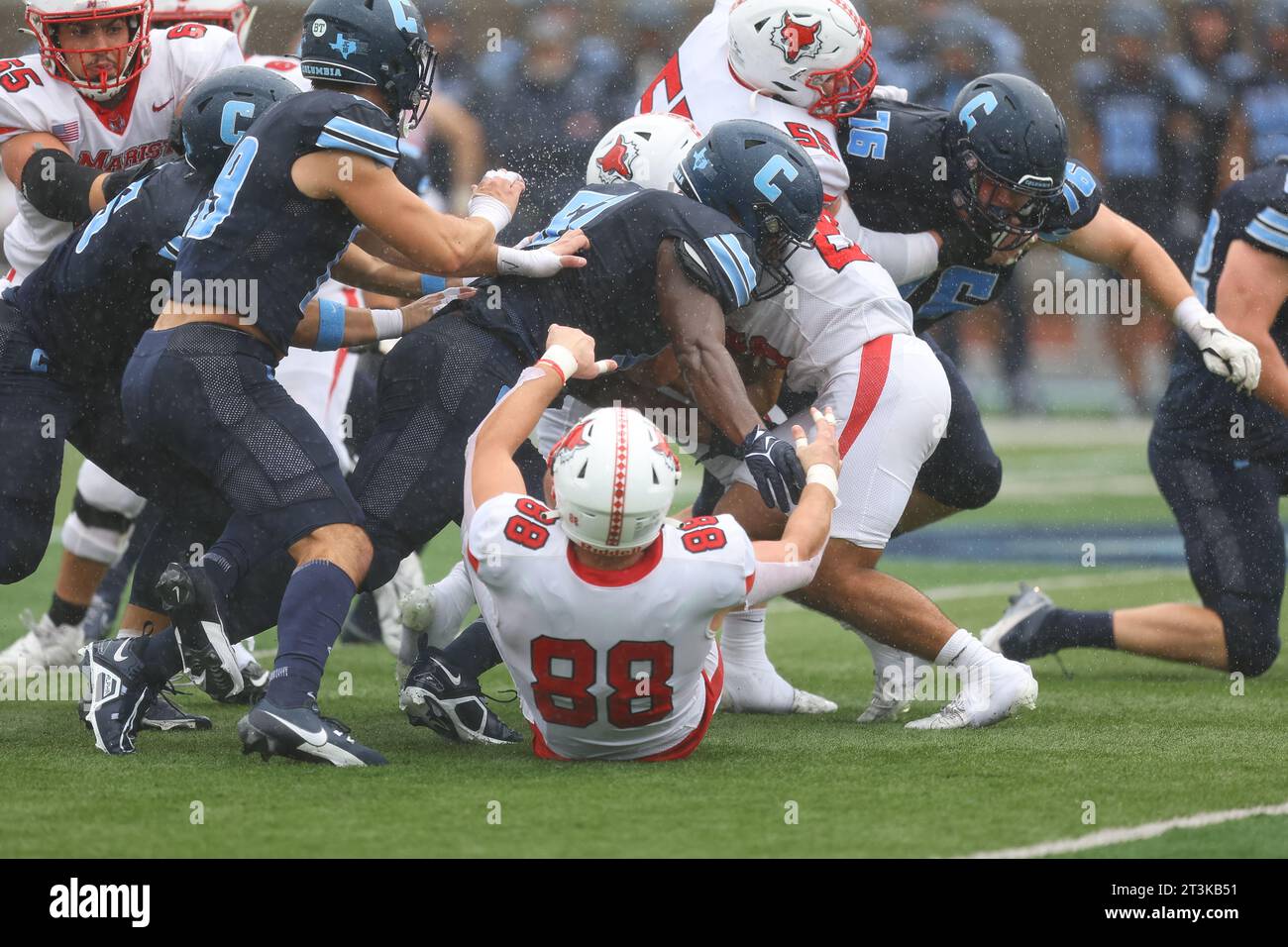 Marist Red Foxes running back Amin Woods #26 is piled up during action in the NCAA football game against the Columbia Lions at Robert K. Kraft Field at Lawrence A. Wien Stadium in New York , New York , Saturday, Oct. 7, 2023. (Photo: Gordon Donovan) Stock Photo