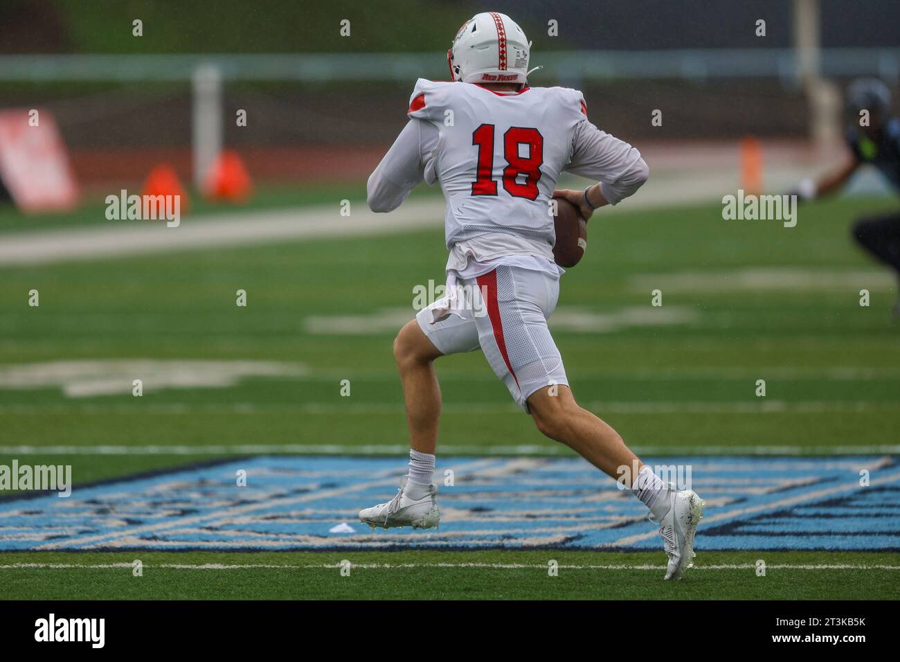Marist Red Foxes quarterback Brock Bagozzi #18 rolls out during action in the NCAA football game against the Columbia Lions at Robert K. Kraft Field at Lawrence A. Wien Stadium in New York , New York , Saturday, Oct. 7, 2023. (Photo: Gordon Donovan) Stock Photo