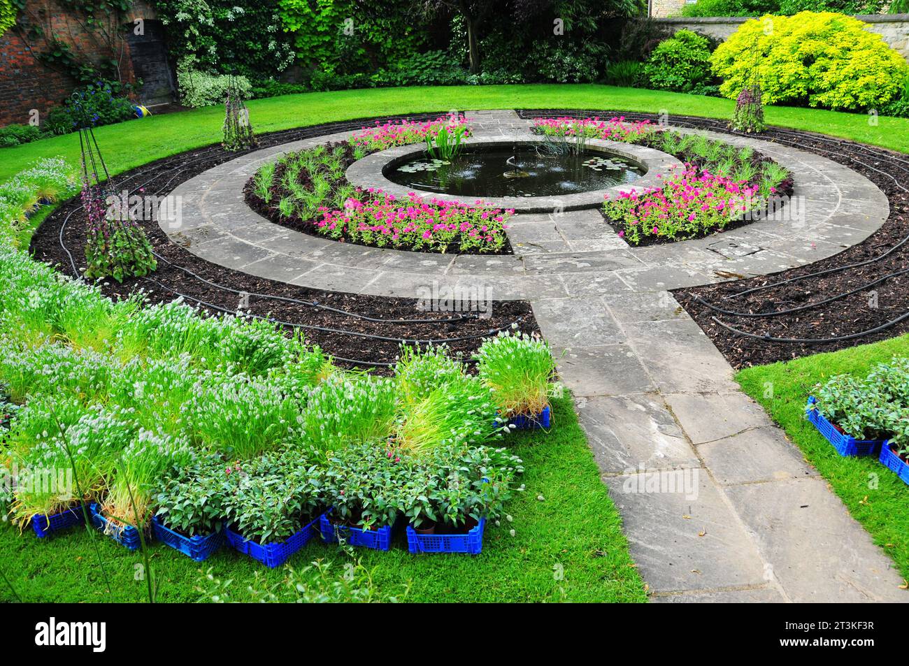 Photo of picture of a fountain in the garden Stock Photo - Alamy