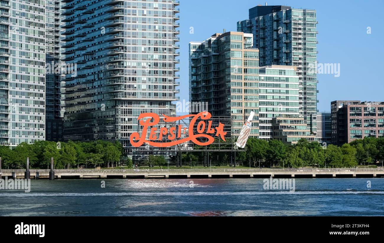 New York – May 2023 – View of the Pepsi-Cola sign, a neon sign at Gantry Plaza State Park in the Long Island City neighborhood of Queens in New York Stock Photo