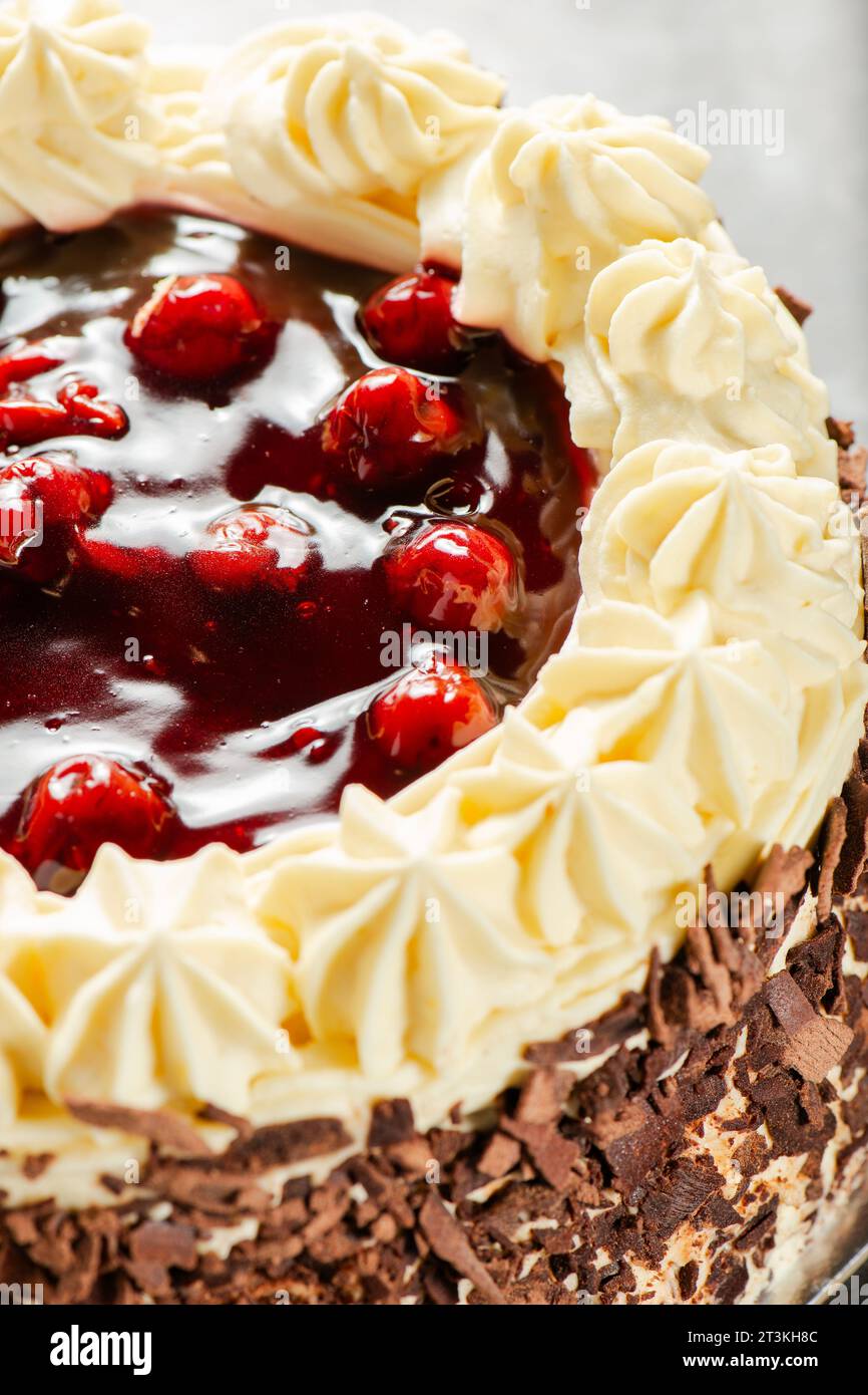 Black forest gateaux cake with a chocolate sponge, cherry compote, and Chantilly cream