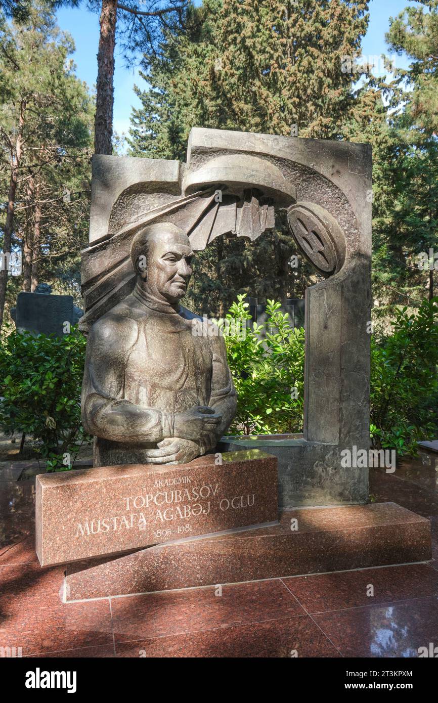 One of the gravesites and statues of a famous scientist in the park. At