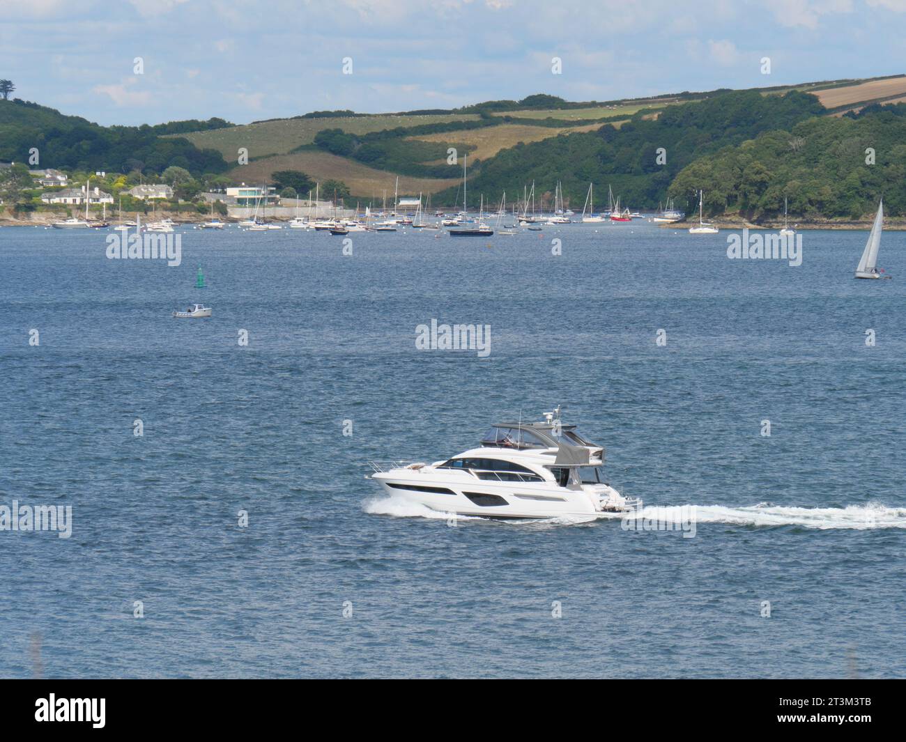 Roadstead A white yacht sailing in front of the roadstead of St Mawes on the ...