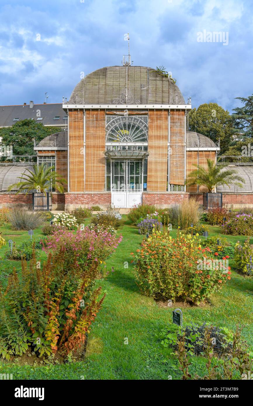The magnificent palm house (La Palmeraie) at Nantes Plant Garden (Jardin des Plantes de Nantes). A botanical garden classified as Jardin Remarquable. Stock Photo