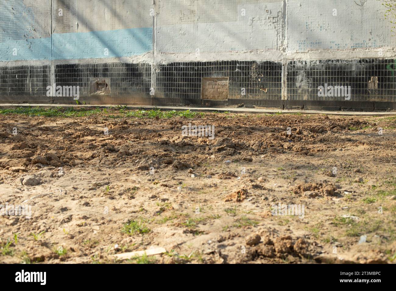 Construction near house. Excavated earth. Excavated soil. Construction ...