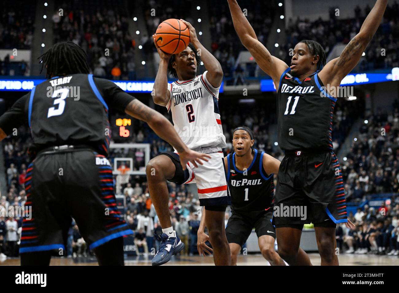FILE UConn's Tristen Newton (2) shoots as DePaul's Jalen Terry (3