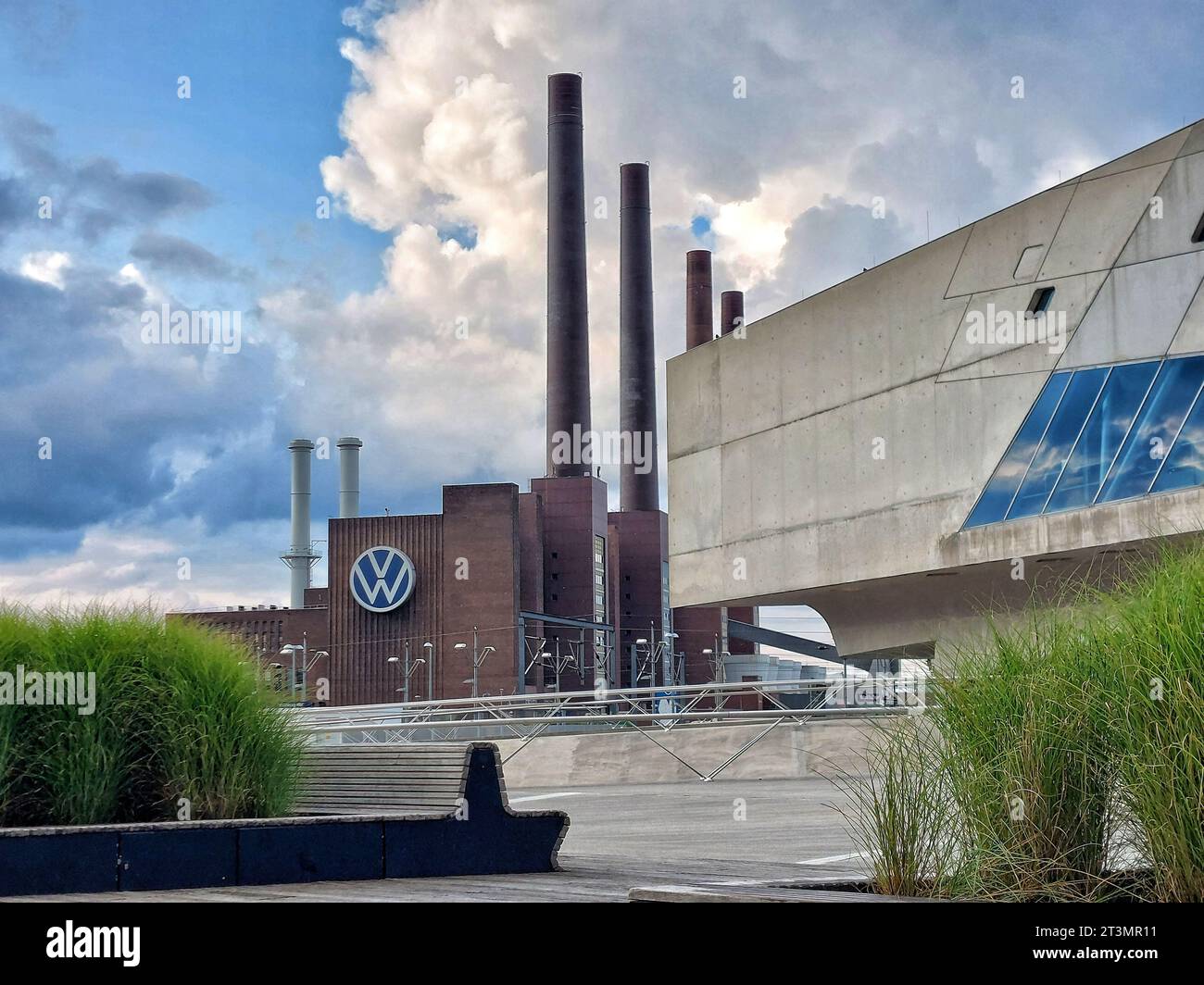 WOLFSBURG, GERMANY - SEP 23 2023 : Volkswagen power plant and phaeno science center in foreground are landmarks of Wolfsburg. Stock Photo