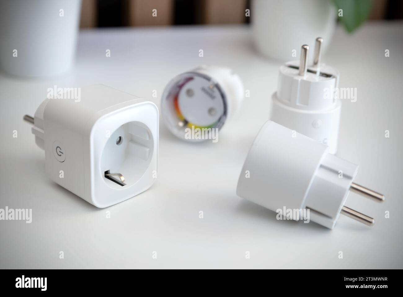 Using Wi-fi smart sockets in a smart home, controlling electricity consumption Stock Photo