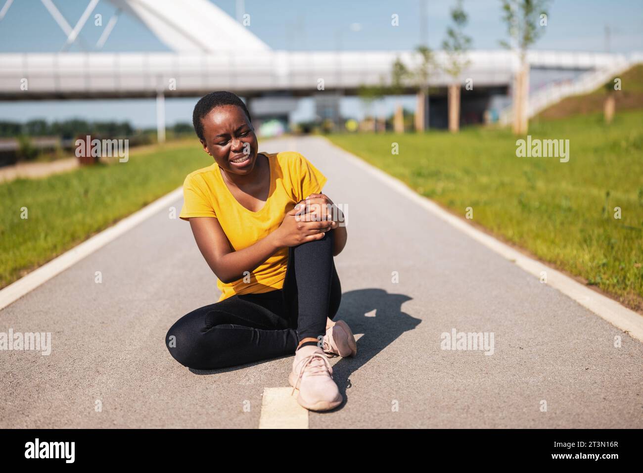 Woman injury ankle street hi-res stock photography and images - Alamy