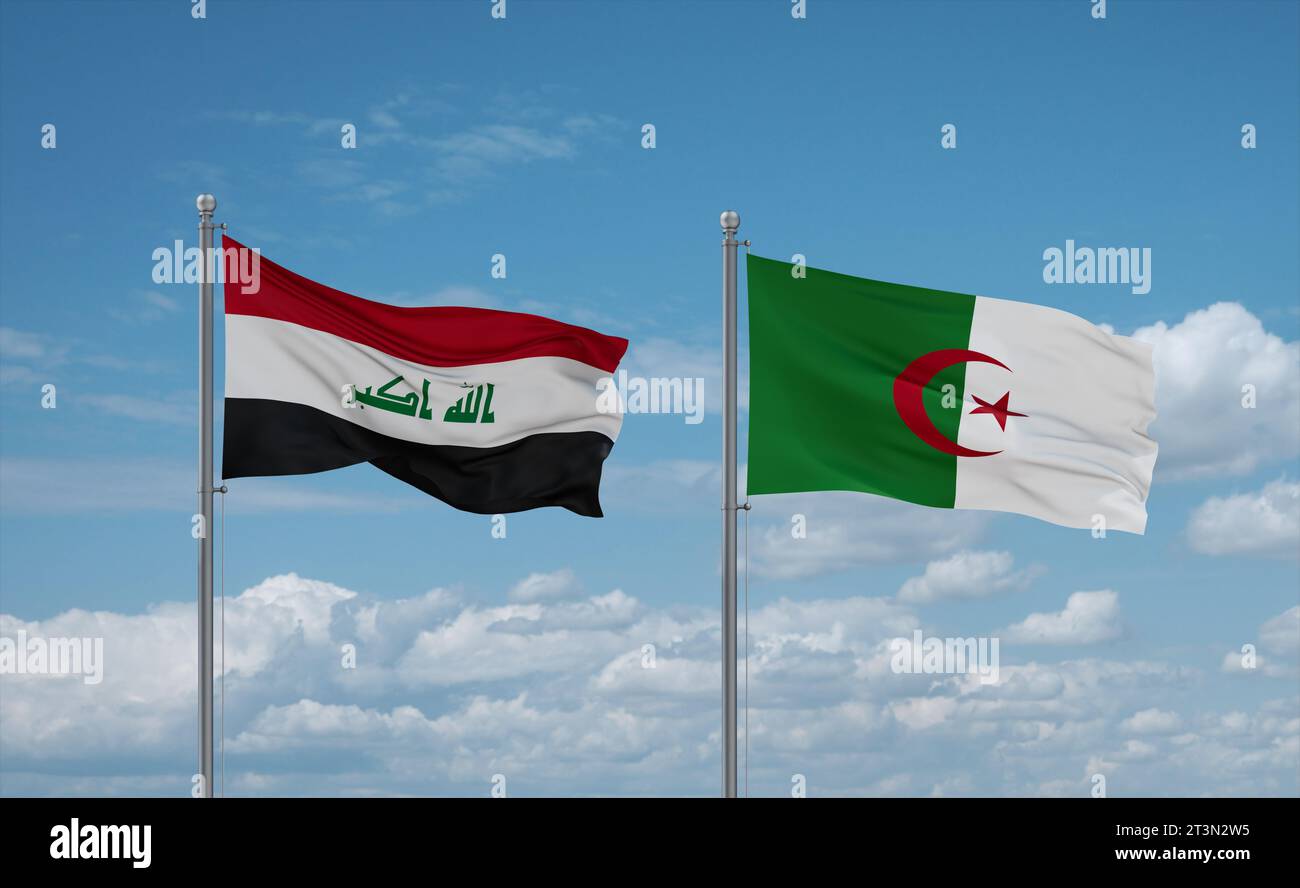 Iraq and Algeria flags waving together in the wind on blue cloudy sky Stock Photo