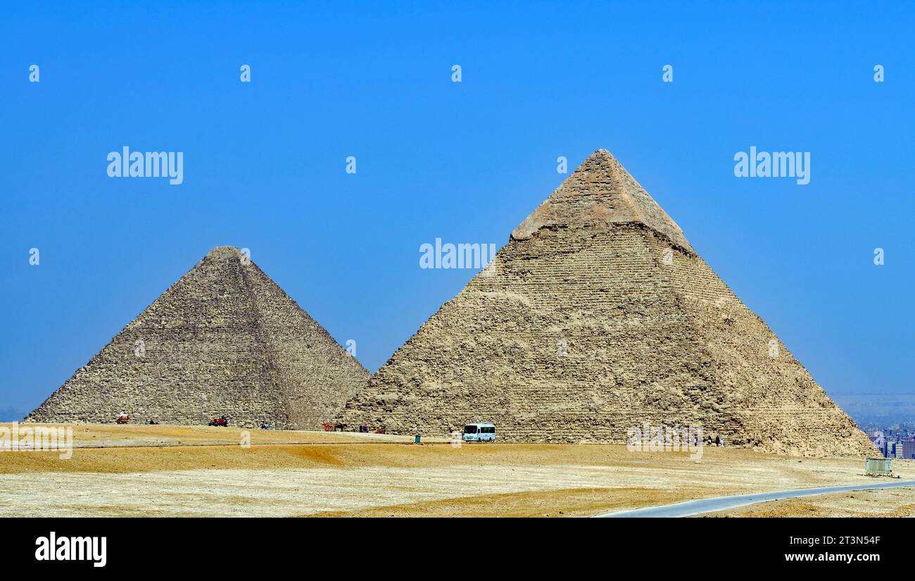 Pyramids in Giza, Egypt Great pyramid also known as Khufu or Cheops and a shorter pyramid