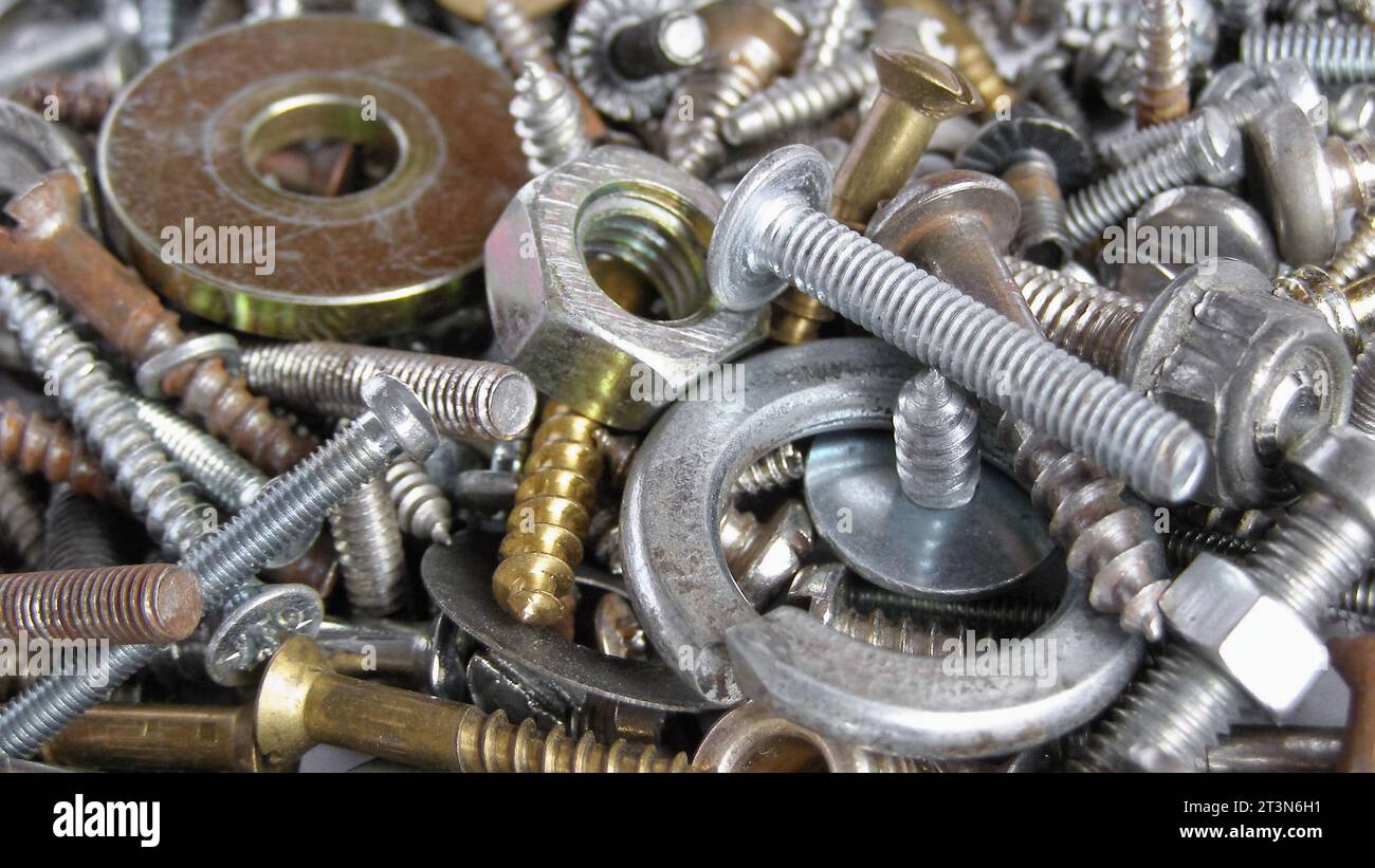 hardware metal background with screws nuts bolts Stock Photo