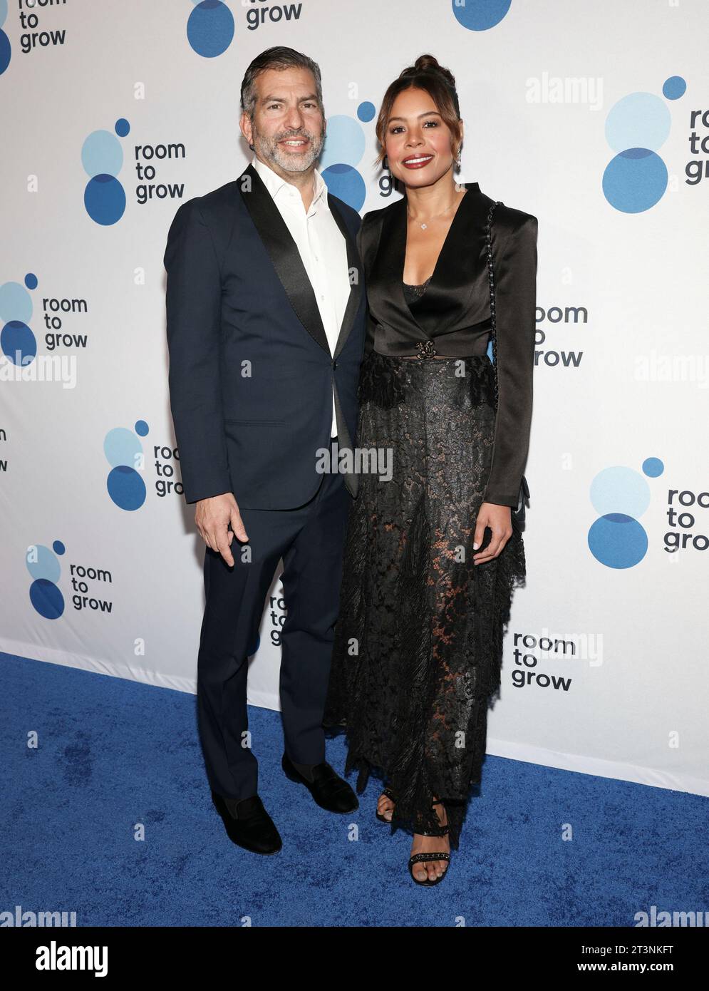 Steven Glenn, Left And Nancy Twine Attend The Room To Grow 25th