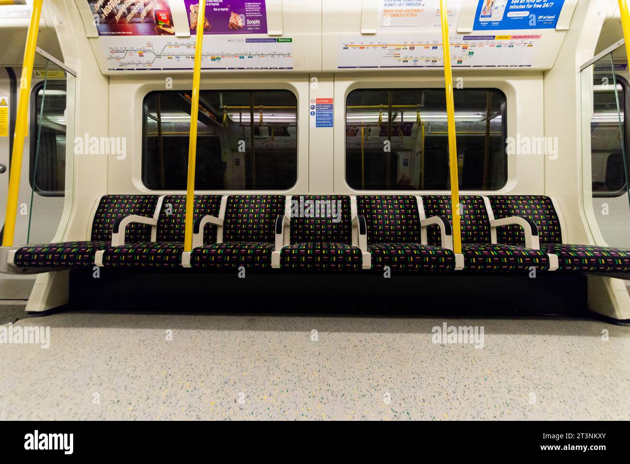 Seats on a London Underground train carriage running on the Circle Line